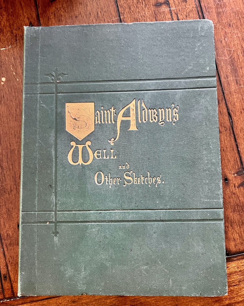 An ald poetry and sketch book called Saint Aldwyn's Well