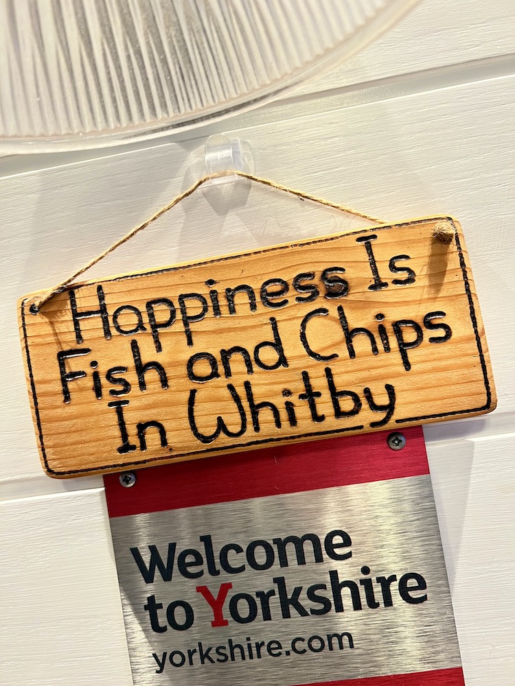 Fish and chip sign in Whitby restaurant