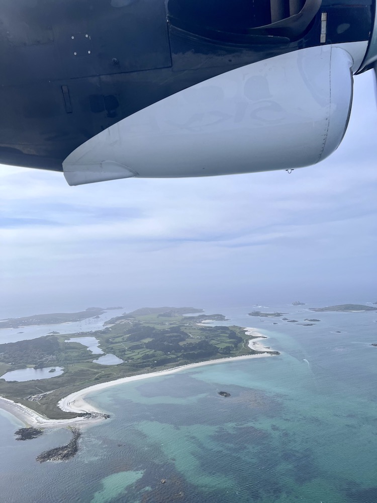 View over the scilly isles from plane window