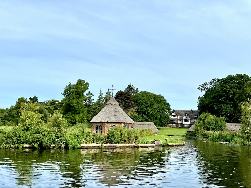 A big house on the river with its own boat mooring at the Norfolk Broads