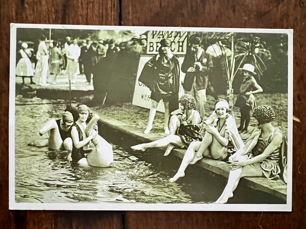 A postcard photograph of London's Palm Beach in 1926 featuring ladies bathing in their bathing suits