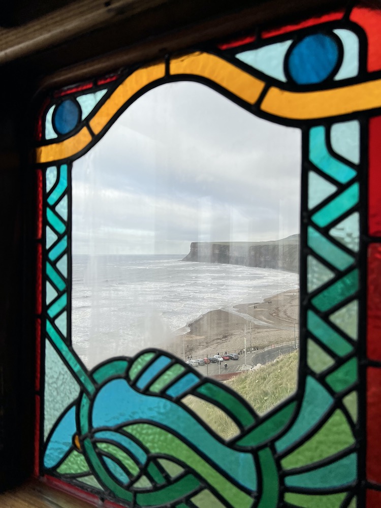 A view from the stained glass window in the carriage of the funicular in Saltburn