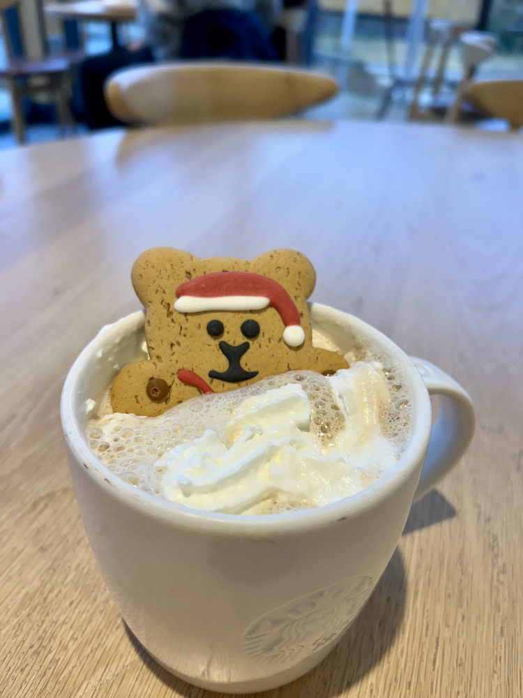 A Teddy biscuit bathing in a cup of coffee