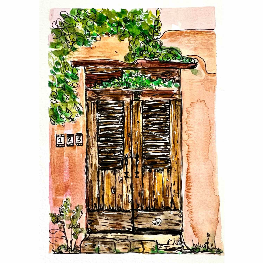 A pen and wash drawing of a wooden door in an Adobe house, New Mexico